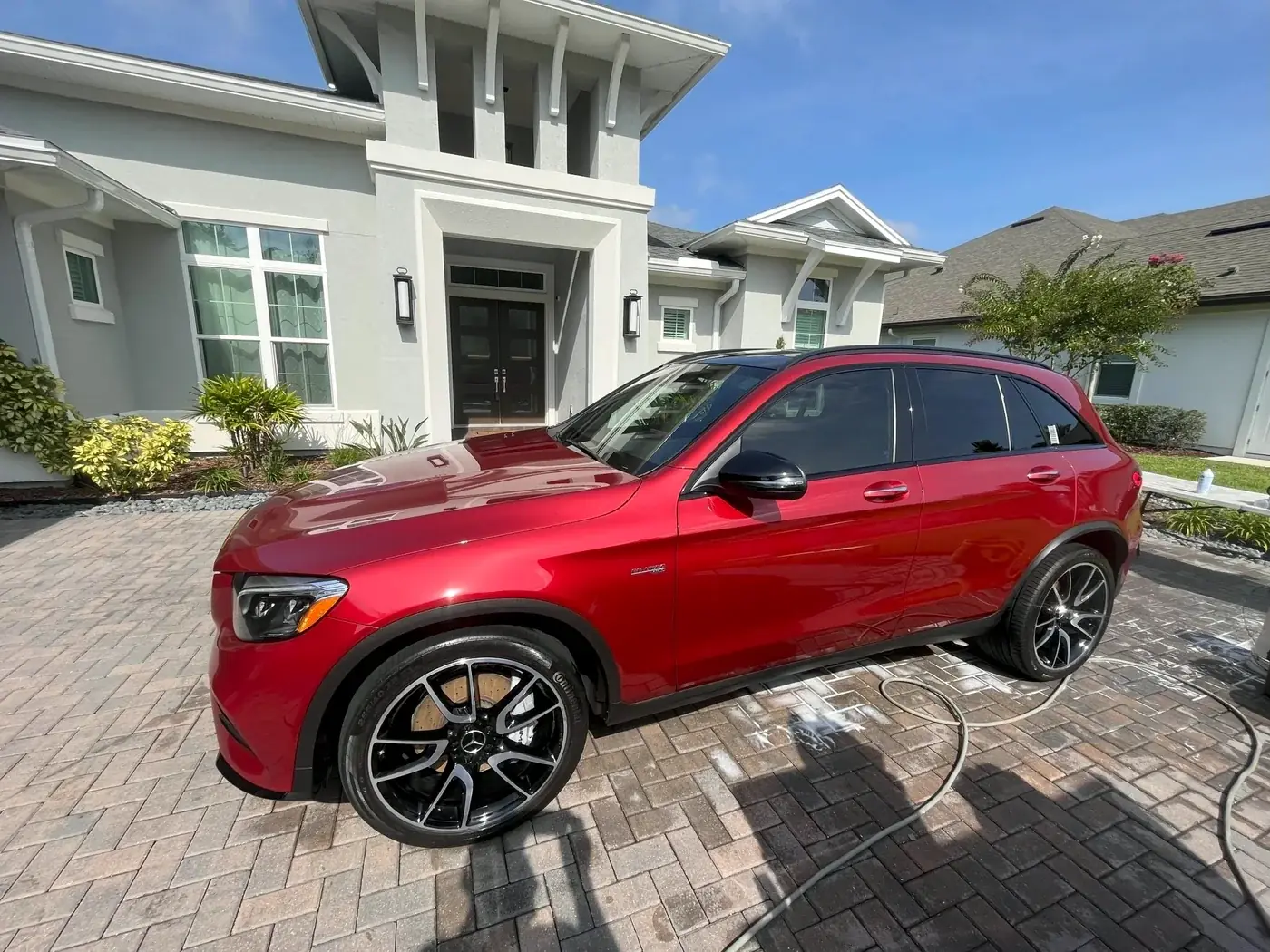 Red Mercedes GLC after a full detail