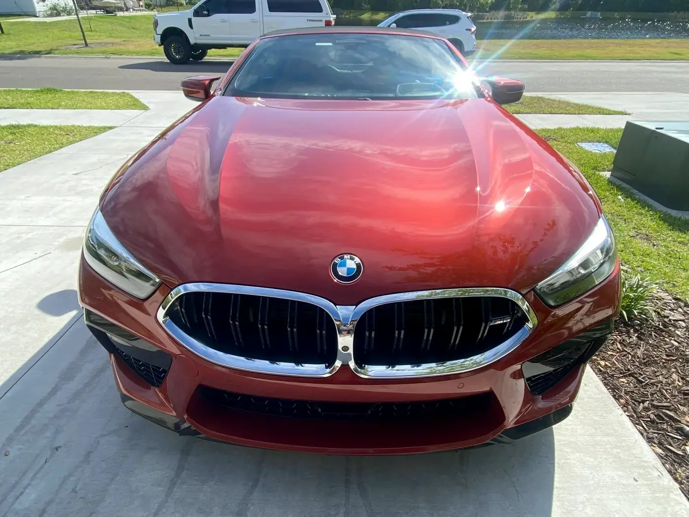 Red BMW M6 with a deep gloss finish
