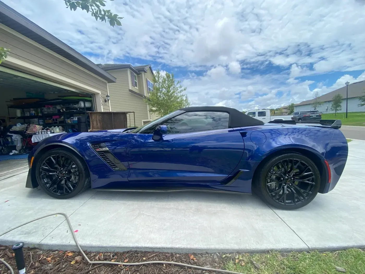 Blue Chevrolet Corvette Z06 detailed on a Florida driveway